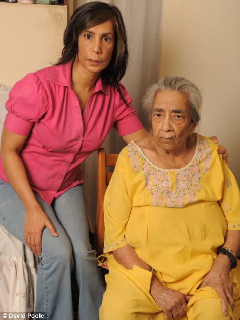 Victims of the system: Sunita Obhrai with her mother Pushpa, whose affairs she has been banned from looking after. 