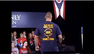 Screenshot, Rear view of U.A.W. Local 1050 Union Member supports Paul Ryan at Youngstown Ohio event 10-13-2012 